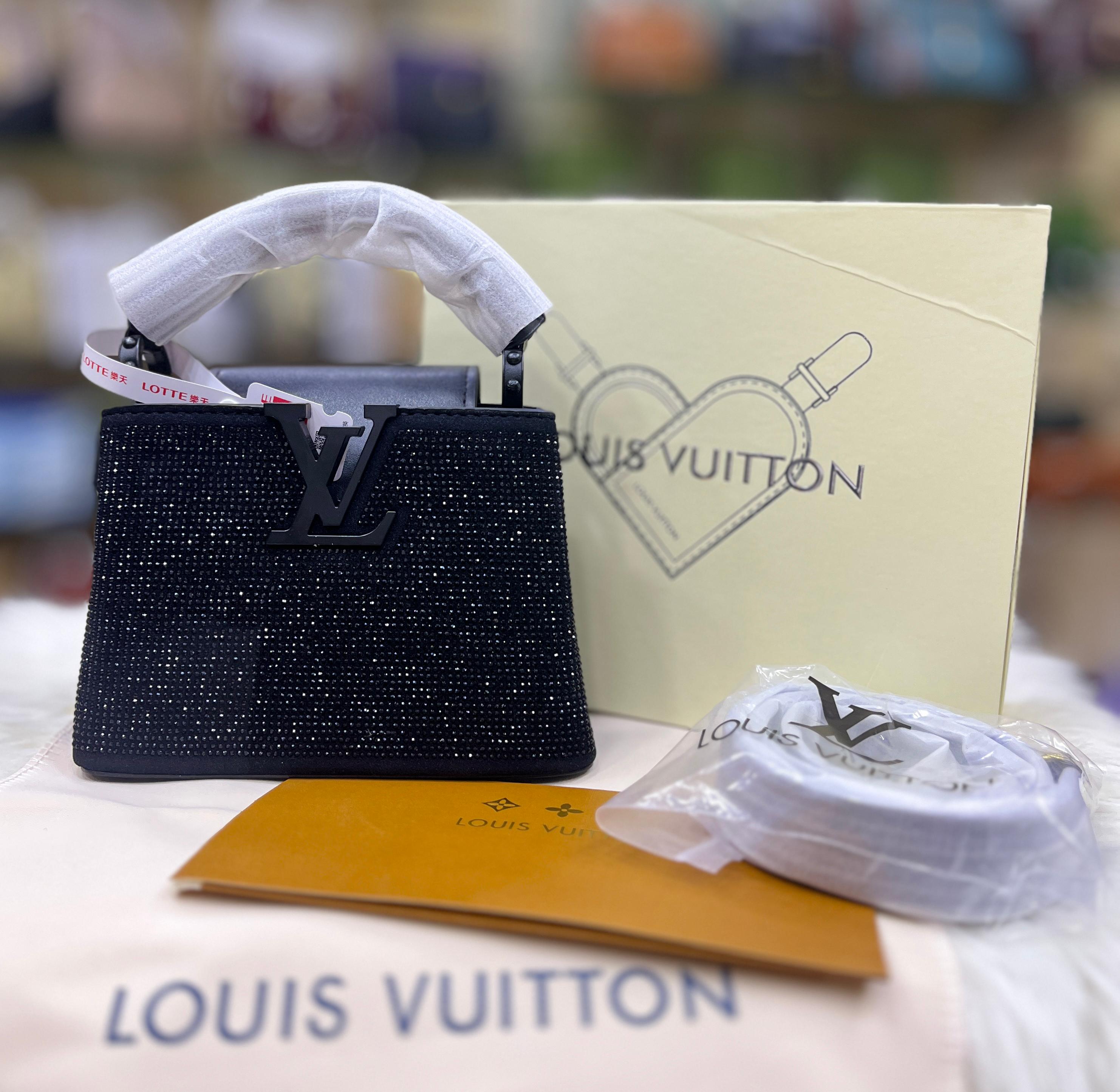 Louis Vuitton* Capucines Mini handbag